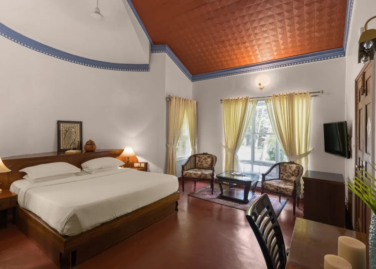غرفة نوم وركن جلوس في Royal Villa