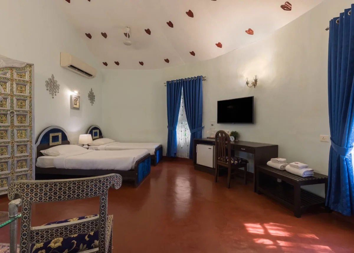 سريران منفصلان في غرفة نوم داخل Royal Villa