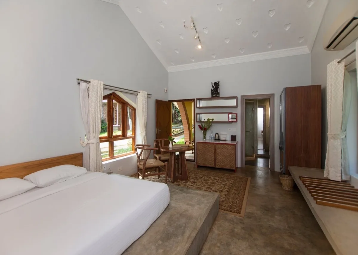 غرفة نوم وركن جلوس في Royal Villa